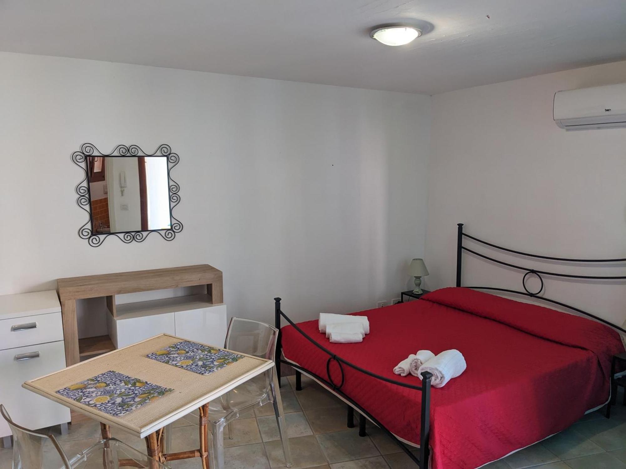 Residenze Il Girasole Aparthotel Golfo Aranci Szoba fotó
